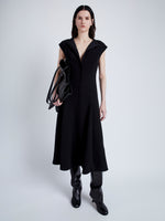 Proenza Schouler Front image of model wearing Chantal Dress in Matte Viscose Crepe in BLACK unzipped