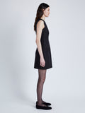 Proenza Schouler Side full length image of model wearing Skyler Dress in Wool Twill Suiting in BLACK