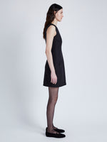 Proenza Schouler Side full length image of model wearing Skyler Dress in Wool Twill Suiting in BLACK