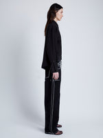 Proenza Schouler Side full length image of model wearing Demi Blouse in Stretch Silk Viscose in BLACK