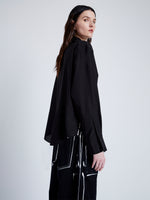 Proenza Schouler Detail image of model wearing Demi Blouse in Stretch Silk Viscose in BLACK