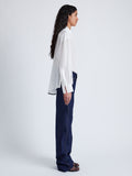 Proenza Schouler Side full length image of model wearing Demi Blouse in Stretch Silk Viscose in BONE