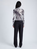 Proenza Schouler Back full length image of model wearing Rio Top in Printed Stretch Tulle Jersey in CONCRETE