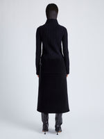 Proenza Schouler Back full length image of model wearing Aida Skirt in Brushed Melange Wool in CHARCOAL MELANGE