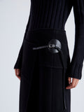 Proenza Schouler Detail image of model wearing Aida Skirt in Brushed Melange Wool in CHARCOAL MELANGE