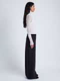 Proenza Schouler Side full length image of model wearing Adriana Skirt in Wool Twill Suiting in BLACK