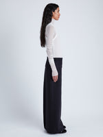 Proenza Schouler Side full length image of model wearing Adriana Skirt in Wool Twill Suiting in BLACK