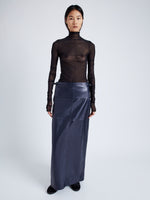 Proenza Schouler Front full length image of model wearing Adriana Skirt in Paper Leather in MIDNIGHT