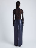 Proenza Schouler Back full length image of model wearing Adriana Skirt in Paper Leather in MIDNIGHT