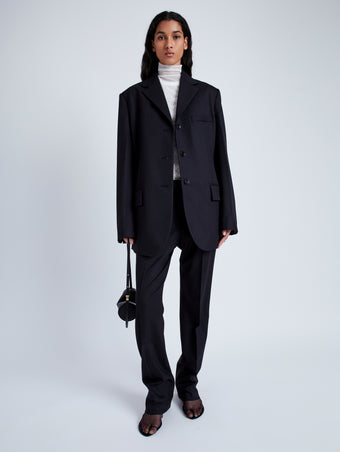 Proenza Schouler Front full length image of model wearing Teddy Pant in Wool Twill Suiting in BLACK