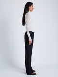 Proenza Schouler Side full length image of model wearing Teddy Pant in Wool Twill Suiting in BLACK