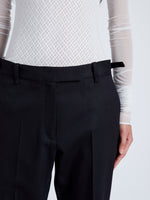 Proenza Schouler Detail image of model wearing Teddy Pant in Wool Twill Suiting in BLACK