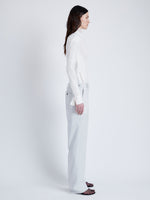 Proenza Schouler Side full length image of model wearing Teddy Pant in Wool Twill Suiting in SMOKE