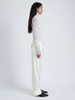 Proenza Schouler Side full length image of model wearing Teddy Pant in Wool Twill Suiting in WAX