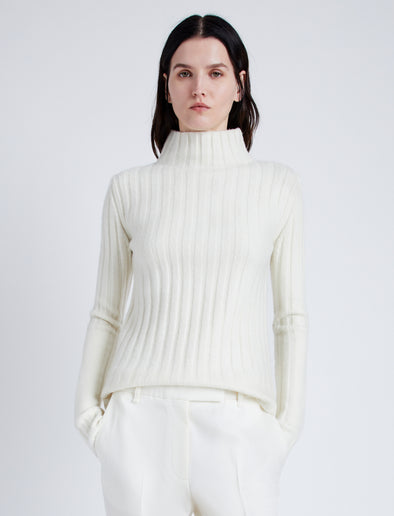 Proenza Schouler Front cropped image of model wearing Haven Sweater in Midweight Cashmere Rib in BONE