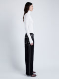 Proenza Schouler Side full length image of model wearing Fox Top In Matte Viscose Rib in WHITE