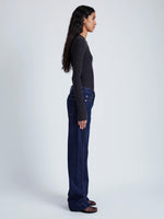 Proenza Schouler Side full length image of model wearing Alyssa Sweater in Midweight Viscose Rib Knit in CHARCOAL