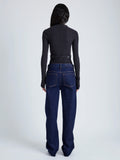 Proenza Schouler Back full length image of model wearing Alyssa Sweater in Midweight Viscose Rib Knit in CHARCOAL