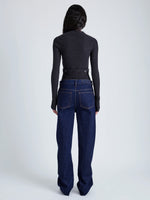 Proenza Schouler Back full length image of model wearing Alyssa Sweater in Midweight Viscose Rib Knit in CHARCOAL