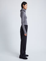 Proenza Schouler Side full length image of model wearing Alyssa Sweater in Midweight Viscose Rib Knit in GREY