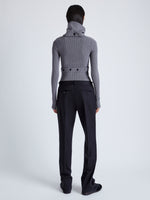 Proenza Schouler Back full length image of model wearing Alyssa Sweater in Midweight Viscose Rib Knit in GREY