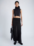 Proenza Schouler Front full length image of model wearing Cruz Vest in Midweight Viscose Rib Knit in CHARCOAL with neck snood