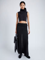 Proenza Schouler Front full length image of model wearing Cruz Vest in Midweight Viscose Rib Knit in CHARCOAL with neck snood