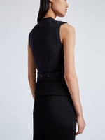 Proenza Schouler Detail image of model wearing Avalon Skirt in Lacqured Viscose in BLACK