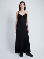 Proenza Schouler Front full length image of model wearing Bella Dress in Lacqured Viscose in BLACK