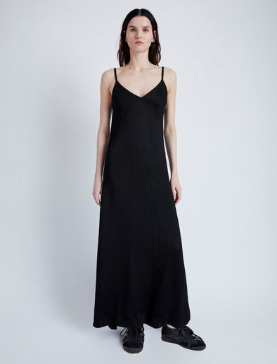 Proenza Schouler Front full length image of model wearing Bella Dress in Lacqured Viscose in BLACK