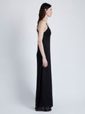 Proenza Schouler Side full length image of model wearing Bella Dress in Lacqured Viscose in BLACK