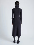 Proenza Schouler Back full length image of model wearing Jocelyn Dress in Midweight Viscose Rib Knit in CHARCOAL