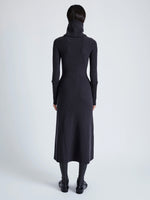 Proenza Schouler Back full length image of model wearing Jocelyn Dress in Midweight Viscose Rib Knit in CHARCOAL