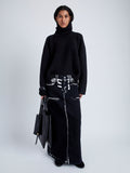 Front full length image of model wearing Yara Sweater In Double Face Cashmere in Black