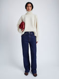 Proenza Schouler front image of model wearing Sandra Turtlneck Sweater in Lofty Eco Cashmere in ECRU