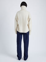 Proenza Schouler back image of model wearing Sandra Turtlneck Sweater in Lofty Eco Cashmere in ECRU