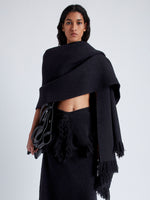 Front cropped image of model wearing Blanket In Textured Boucle Knit in Black