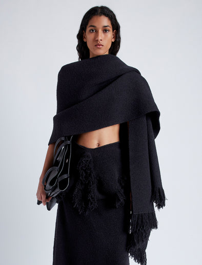 Front cropped image of model wearing Blanket In Textured Boucle Knit in Black