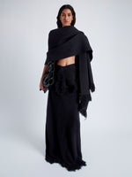 Front image of model wearing Blanket In Textured Boucle Knit in Black