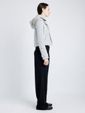 Proenza Schouler Side full length image of model wearing Rivers Jacket in Cotton Wool Jacquared in BLACK/OFF WHITE