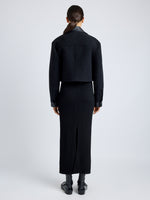 Proenza Schouler Back full length image of model wearing Reyes Jacket in Boiled Wool Jersey in BLACK