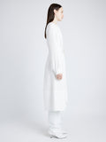 Proenza Schouler Side full length image of model wearing Enya Dress in Lightweight Matte Viscose Crepe in WHITE