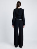 Proenza Schouler Back full length image of model wearing Alexis Top in Matte Viscose Crepe with Faux Leathe in BLACK