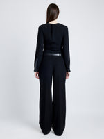 Proenza Schouler Back full length image of model wearing Alexis Top in Matte Viscose Crepe with Faux Leathe in BLACK