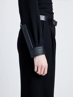 Proenza Schouler Detail image of model wearing Alexis Top in Matte Viscose Crepe with Faux Leathe in BLACK