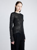 Proenza Schouler Detail image of model wearing Sophie Long Sleeve Top in Sequin in BLACK