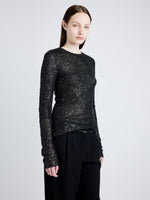 Proenza Schouler Detail image of model wearing Sophie Long Sleeve Top in Sequin in BLACK