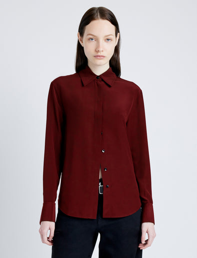 Proenza Schouler cropped front image of model wearing Arabella Top in Eco Silk in OX BLOOD