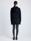 Proenza Schouler Back full length image of model wearing Mei Skirt in Boiled Wool Jersey in BLACK