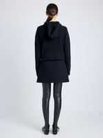 Proenza Schouler Back full length image of model wearing Mei Skirt in Boiled Wool Jersey in BLACK